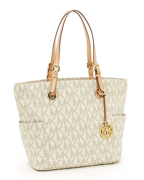 michael kors jet set logo large vanilla totes|Michael Kors wallet jet set.